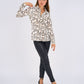 Leopard Print Basic Shirt featuring a classic button-down design, relaxed fit, and timeless animal print for a bold and versatile look.