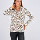 Leopard Print Basic Shirt featuring a classic button-down design, relaxed fit, and timeless animal print for a bold and versatile look.