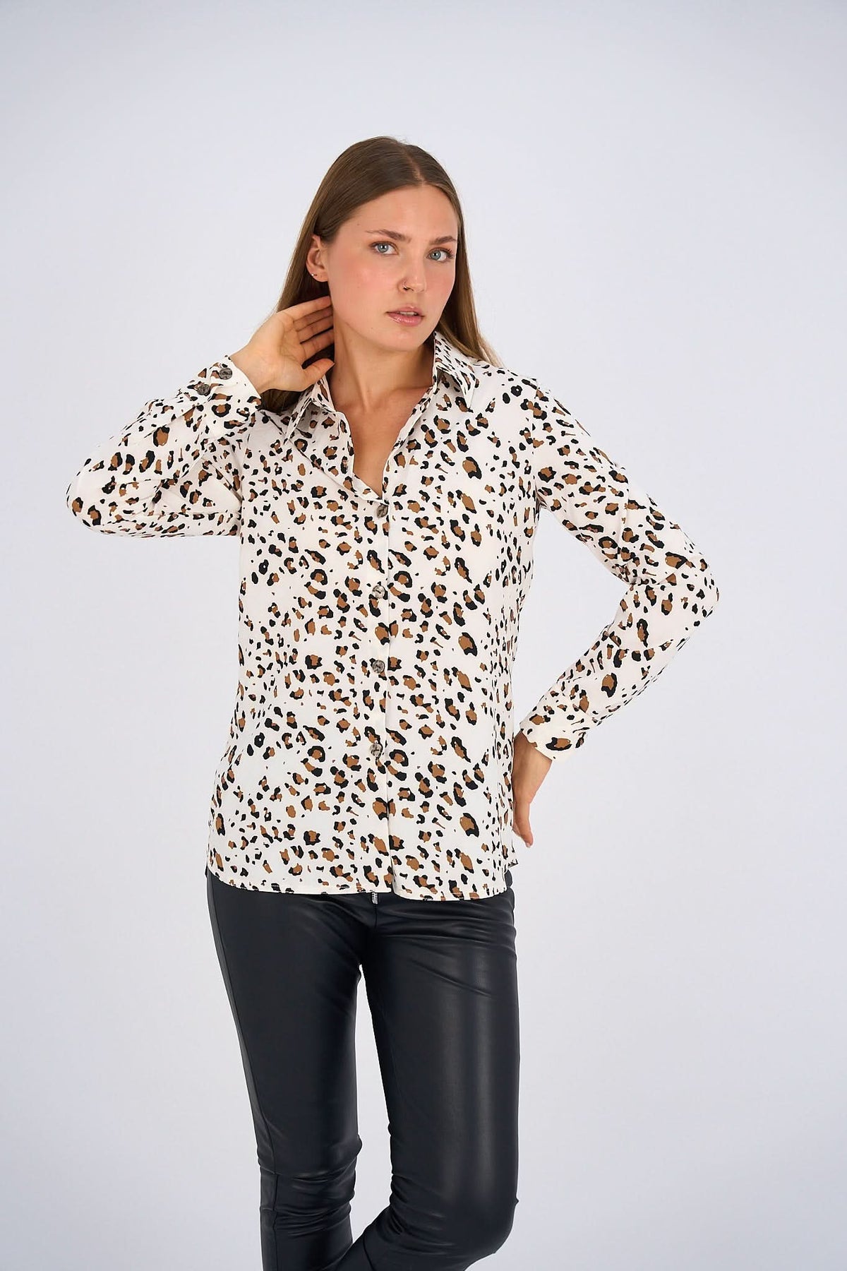 Leopard Print Basic Shirt featuring a classic button-down design, relaxed fit, and timeless animal print for a bold and versatile look.