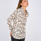 Leopard Print Basic Shirt featuring a classic button-down design, relaxed fit, and timeless animal print for a bold and versatile look.