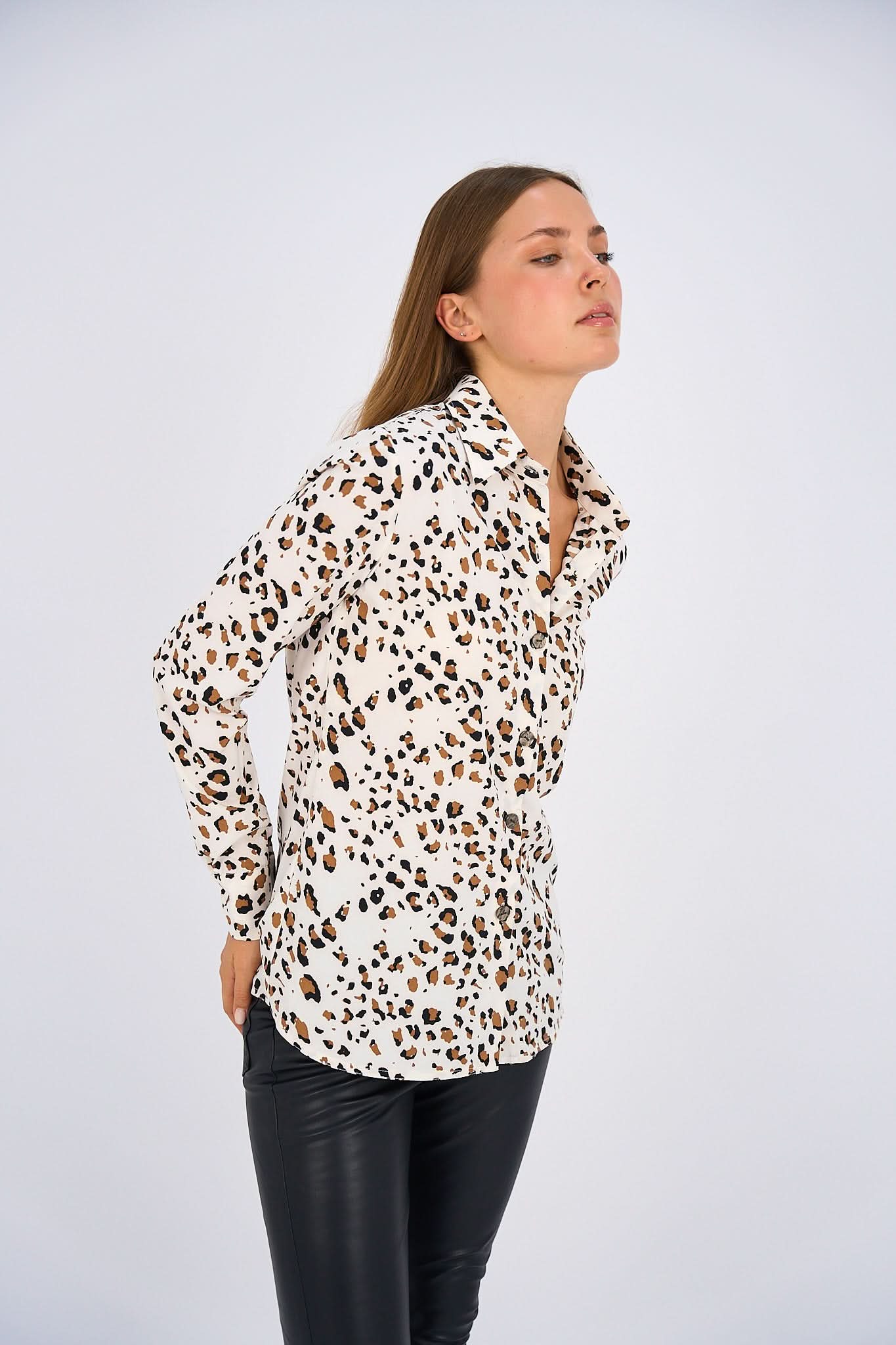 Leopard Print Basic Shirt featuring a classic button-down design, relaxed fit, and timeless animal print for a bold and versatile look.