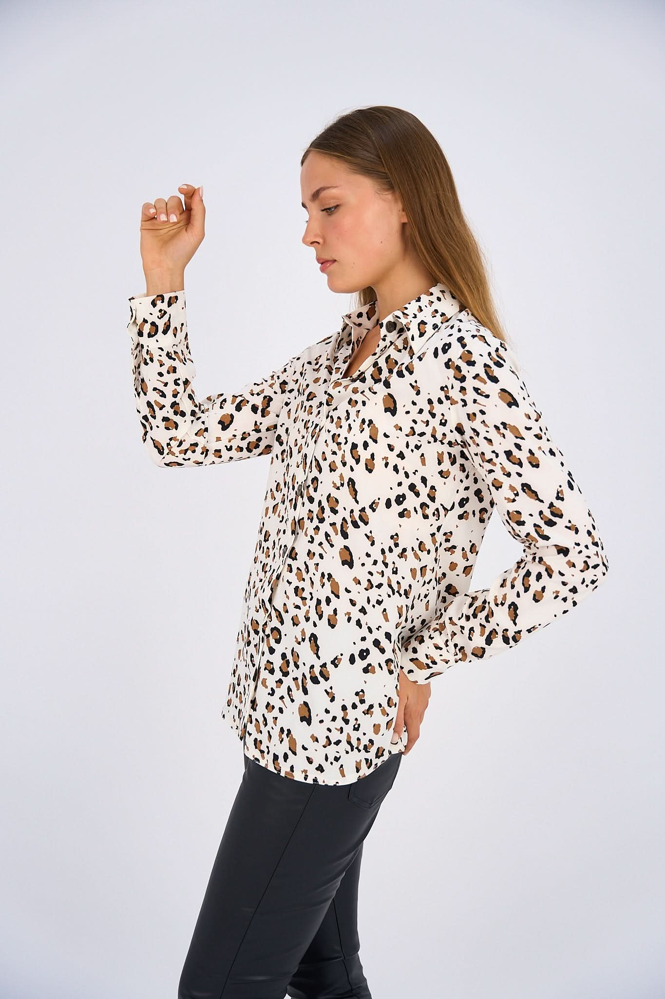 Leopard Print Basic Shirt featuring a classic button-down design, relaxed fit, and timeless animal print for a bold and versatile look.