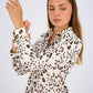 Leopard Print Basic Shirt featuring a classic button-down design, relaxed fit, and timeless animal print for a bold and versatile look.