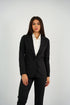 Black Single-Button Blazer featuring a structured fit, tailored silhouette, and a sleek single-button closure, perfect for office wear or smart-casual styling.