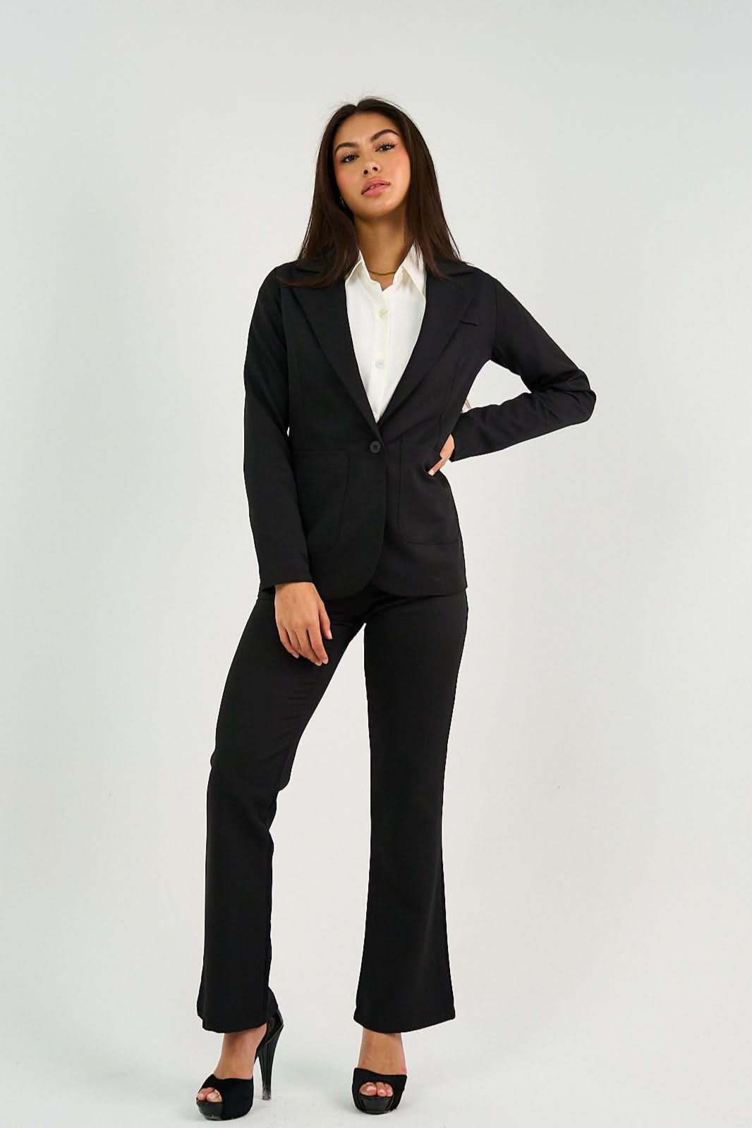 Black Single-Button Blazer featuring a structured fit, tailored silhouette, and a sleek single-button closure, perfect for office wear or smart-casual styling.